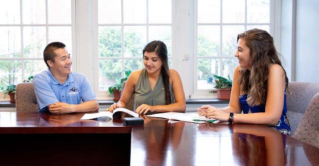 Students in a business meeting