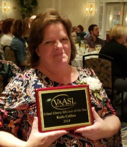 picture Dr. Karla Collins holding the 2019 School Library Educator Award