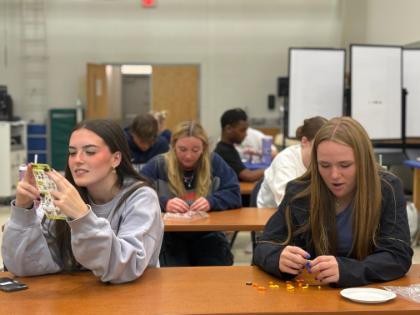 Students participate in LEGO activity in KINS 205