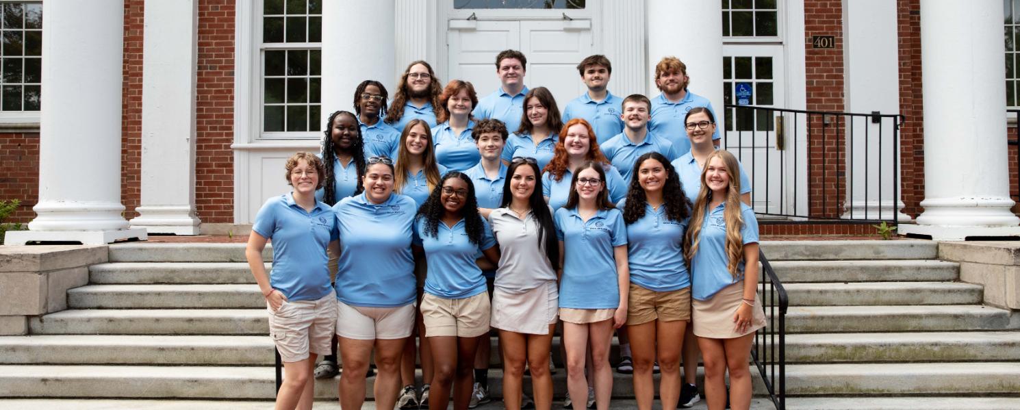 Longwood peer mentors pose together on the steps of Eason ahead of welcoming the incoming class.