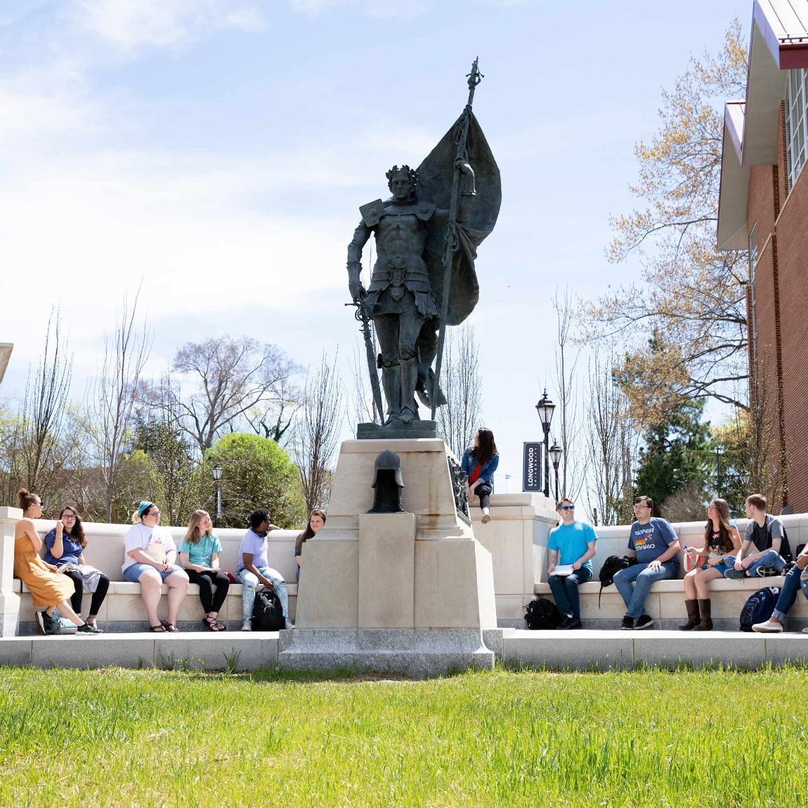 Students often enjoy classes outside surrounded by the beauty of our historic campus where old blends with new, like the more than 15-feet-tall bronze statue of Joan of Arc dedicated in 2018. 