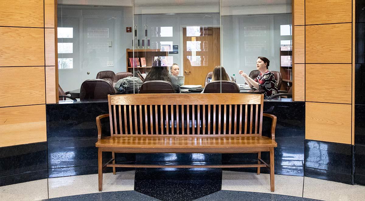 It&rsquo;s not just small classes that are the hallmark of a Longwood education but also the fact that those small classes are taught by full-time professors. Dr. Elif Guler, associate professor of English, takes extra time to explain a point to students in Grainger Hall.
