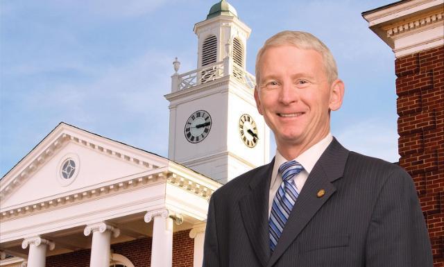 Patrick Finnegan in front of Lancaster Hall