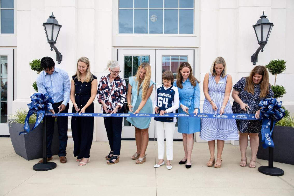 Left-to-right: DA Houston '24, Anne-Hamilton LeRoy '24, Kim Bass, Louise Waller MBA '10, Joan Perry Brock '64, Katharine Bond '98, Courtney Hodges, Meredith Foster '24