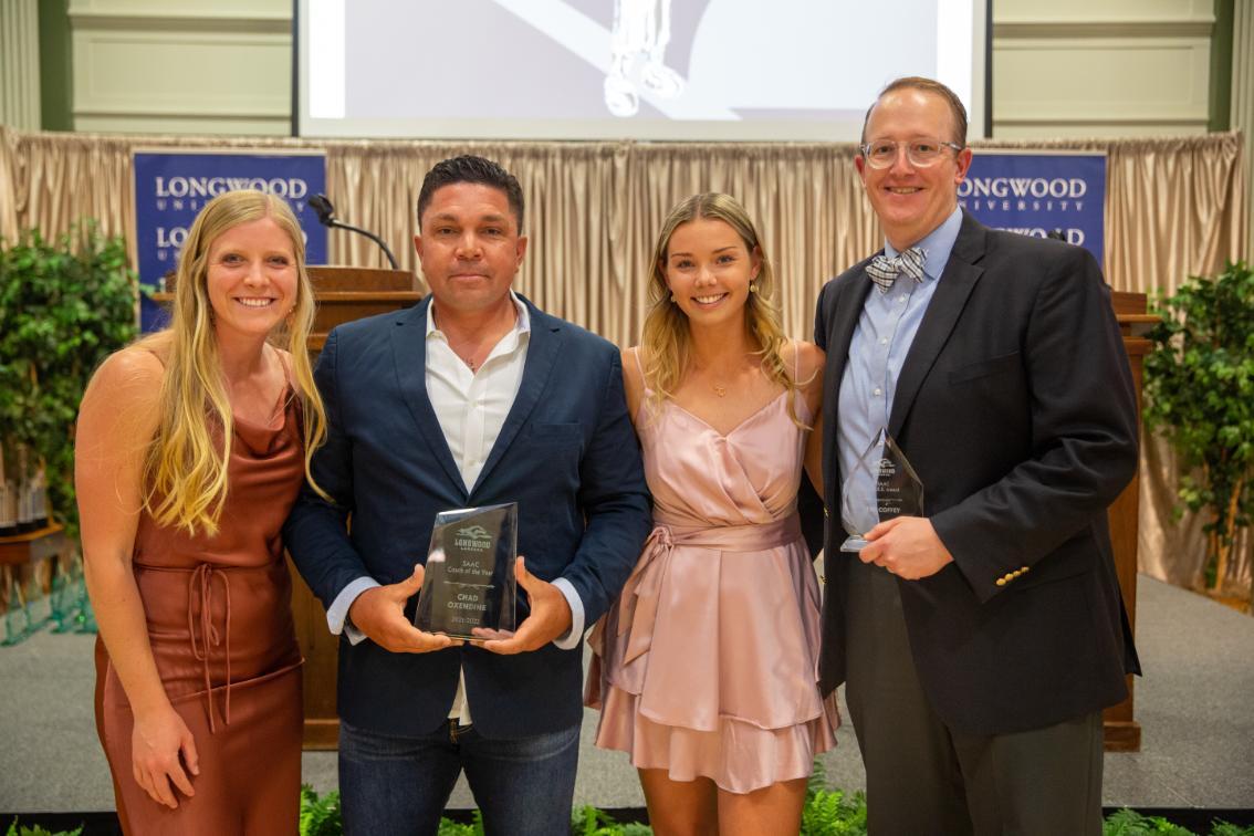 Dr. Tim Coffey (right) was presented with the ACES (Acclaimed Commitment to the Excellence of Student-Athletes) Award by Longwood's Student-Athlete Advisory Committee in 2022.