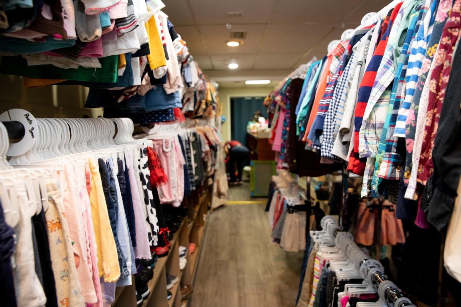 Infant and children's clothes fill the racks of A Giving Tree