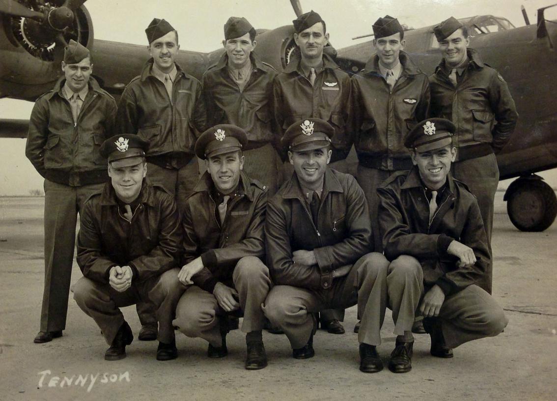 The crew of Heaven Can Wait and other B-24 crewmembers. 2nd Lt. Thomas V. Kelly, Jr. is located in the far right of the second row.