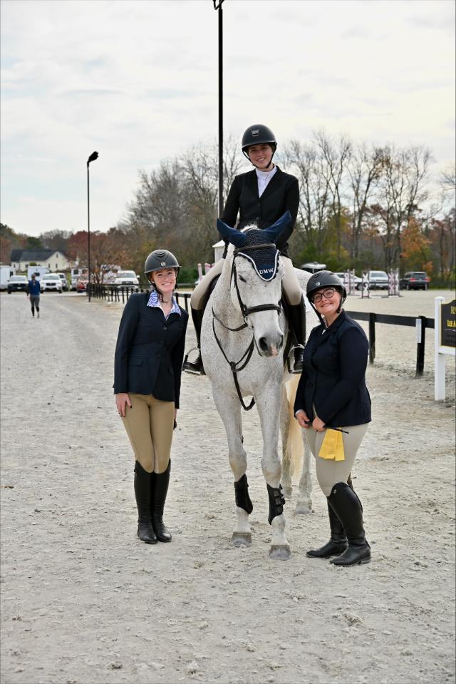 From left to right, Alison Tomlin ’29, Madison Zipf ’28 and Lorelei Long ’27 pause for a photo during a break from competition.