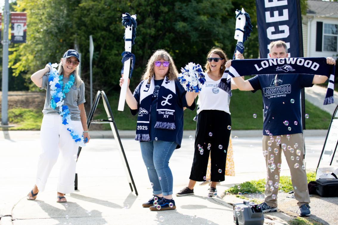 Staff volunteers, including some from Greenwood Library, welcomed new Lancers to campus during freshman move-in at the corner of Main Street and Wynne Drive.